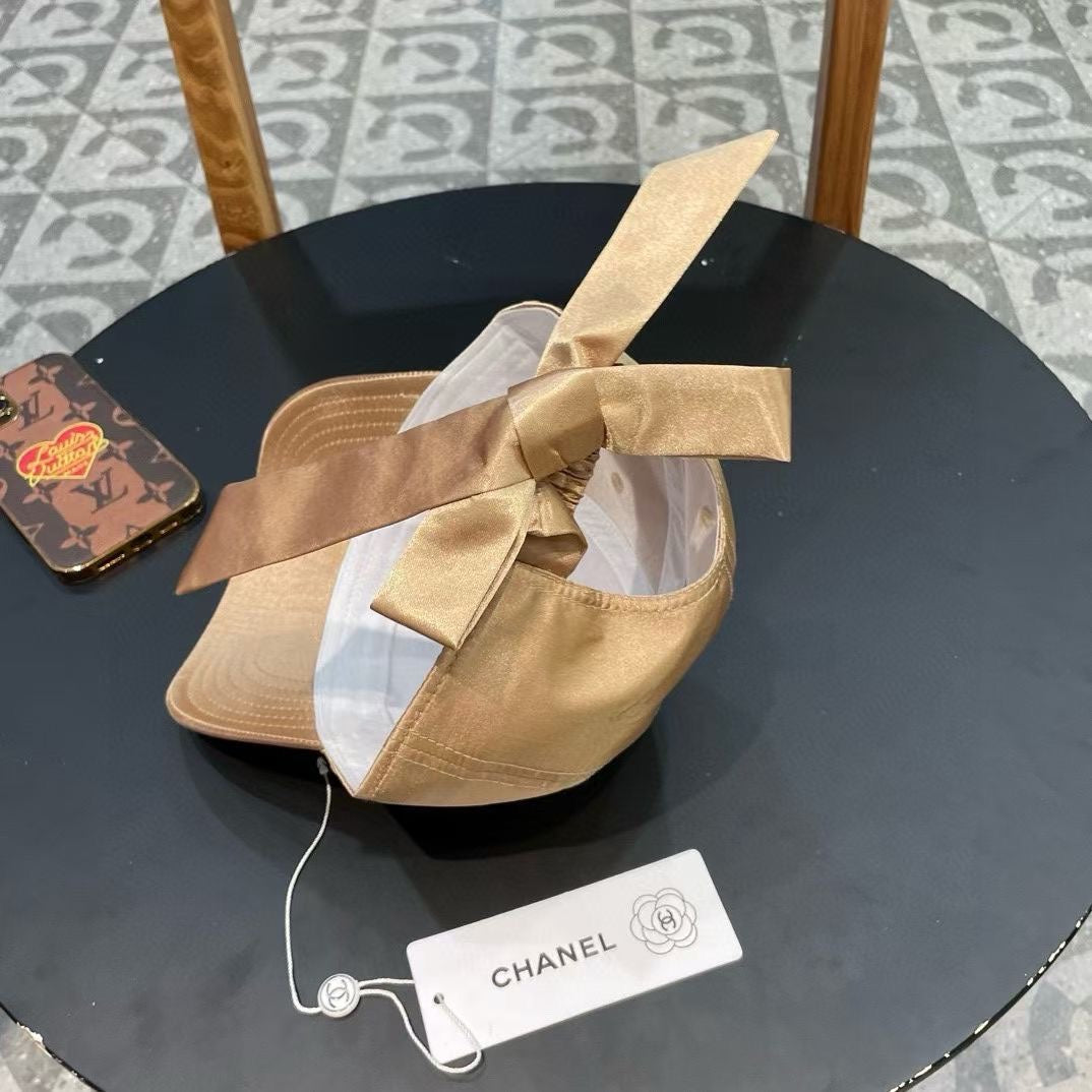 CHANEL BASEBALL HAT IN GOLD SILK SATIN 404866