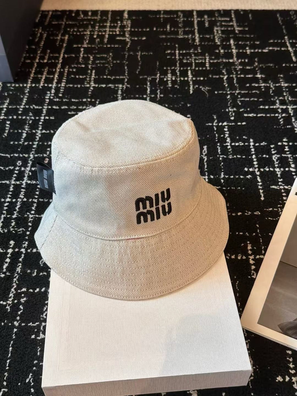MIU MIU MM CLASSIC REVERSIBLE BUCKET HAT IN LIGHT BEIGE AND BLACK FABRIC